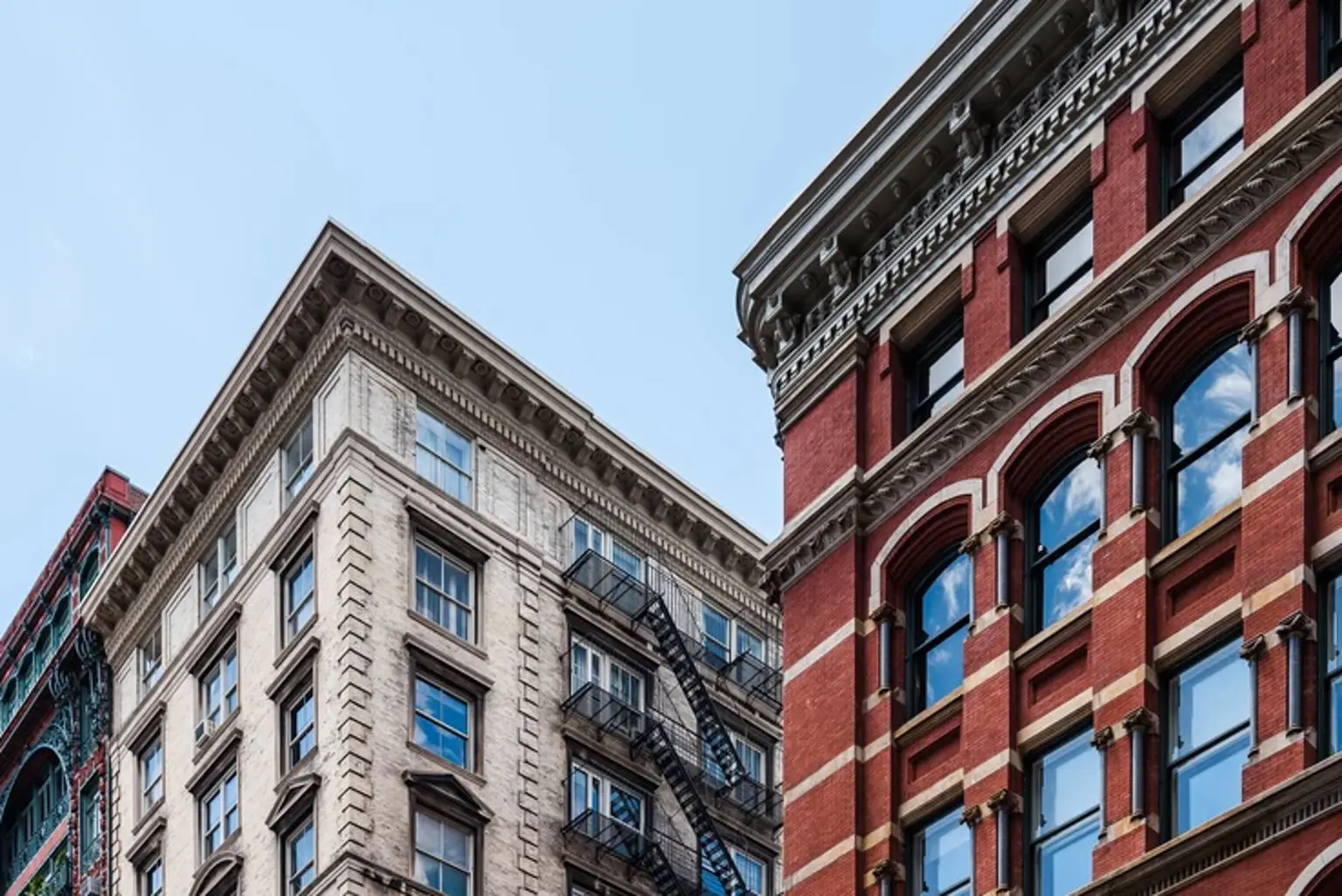 A close up of two buildings with windows